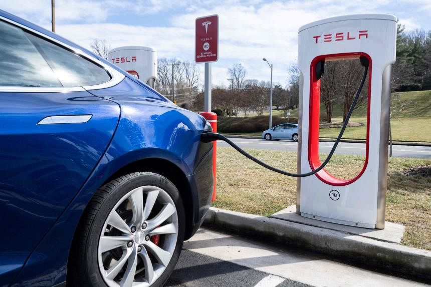 Musk disbands Tesla EV charging team, leaving customers in the dark | The Straits Times